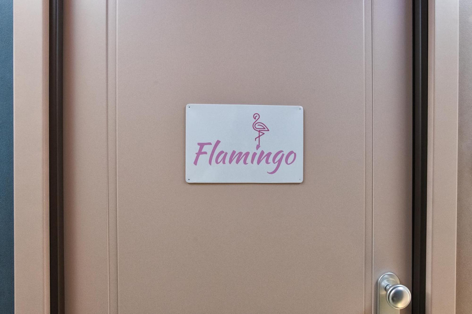 Pink Flamingo Balcony By Station Apartment