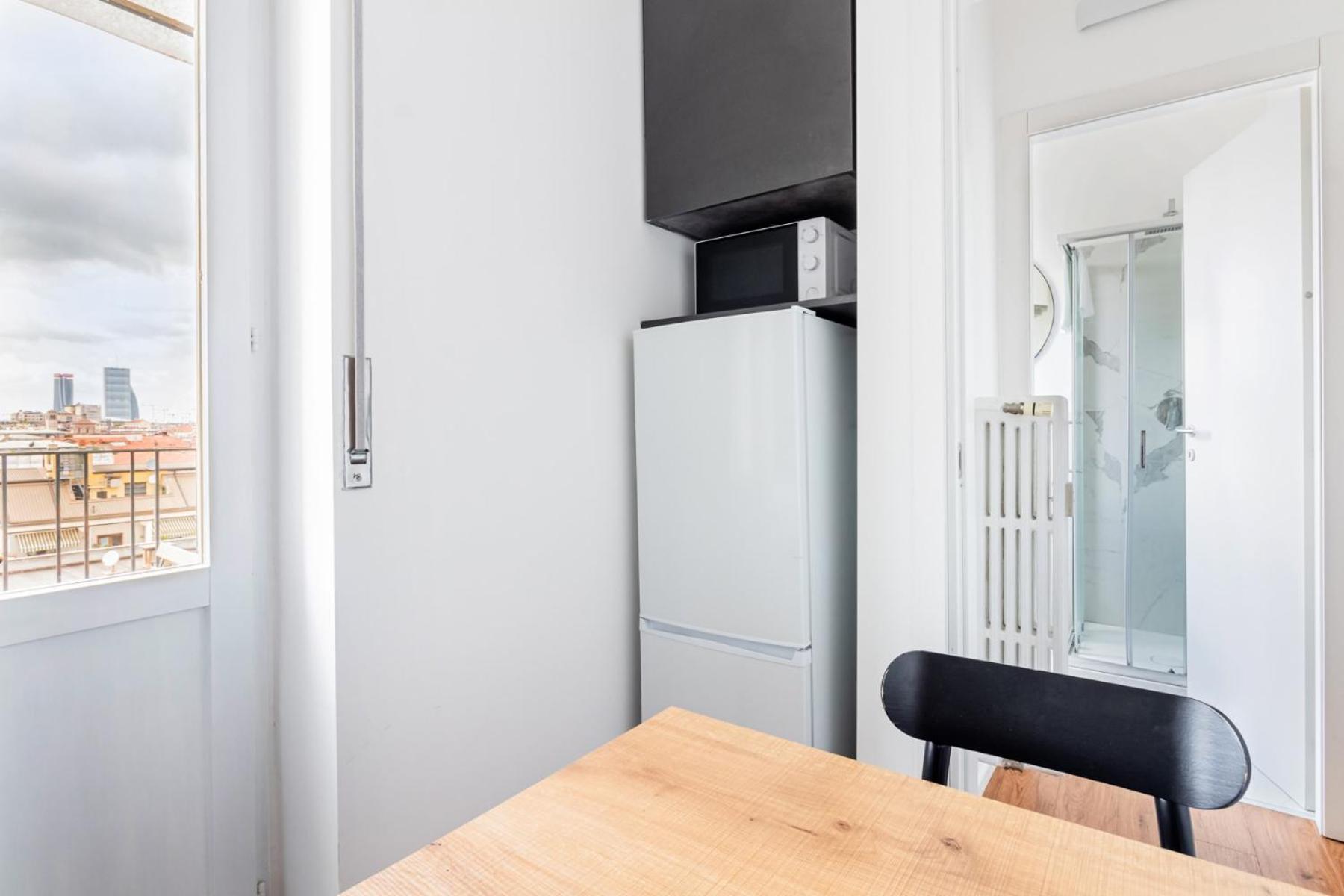 Homeby, Cozy Penthouse Appartamento Milano