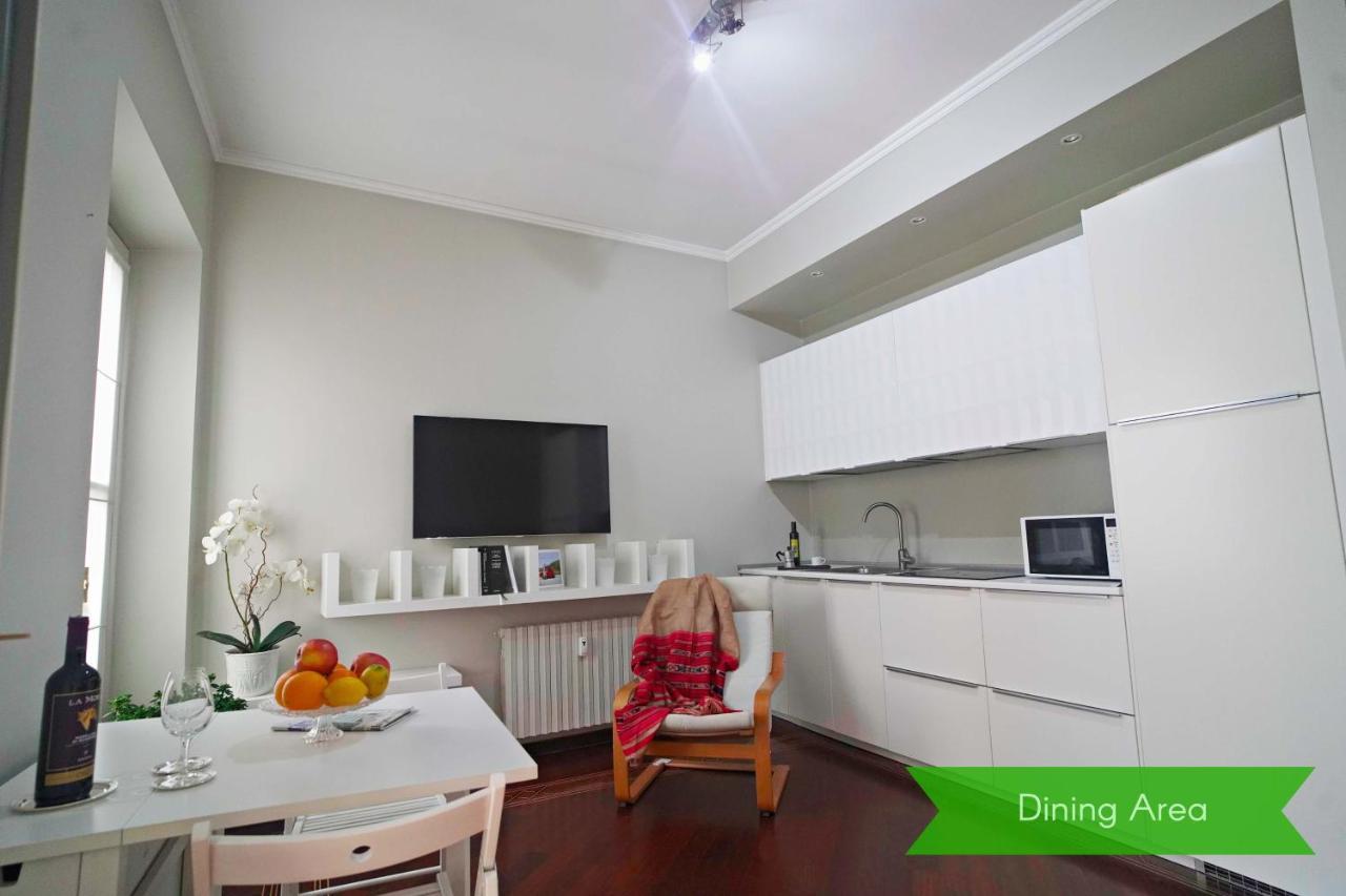 Chic 1bdr With Shared Terrace Steps From Duomo By Rentopolis Milano