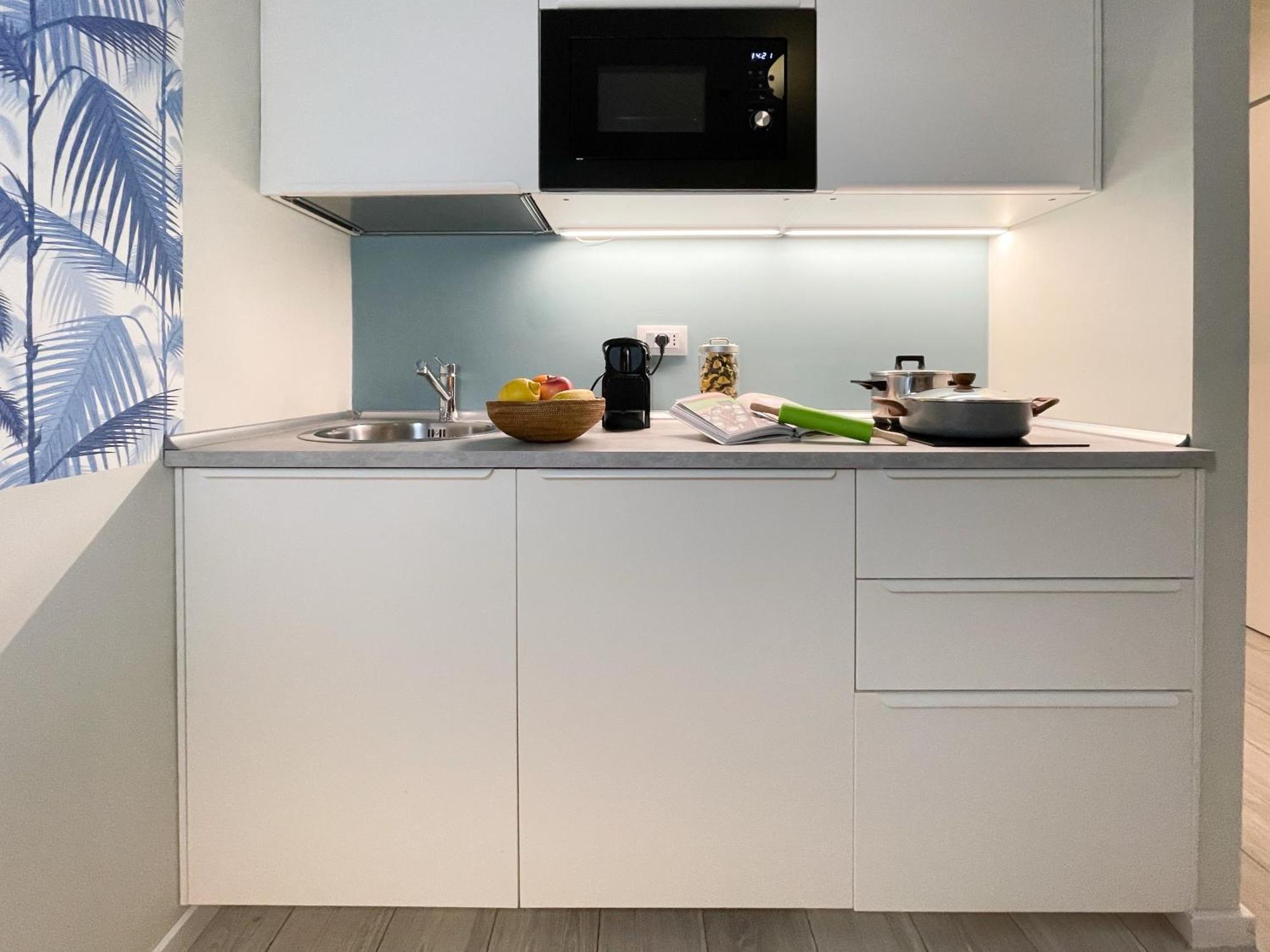 Apartment Blue Palm Jungle Self Checkin Design Milan